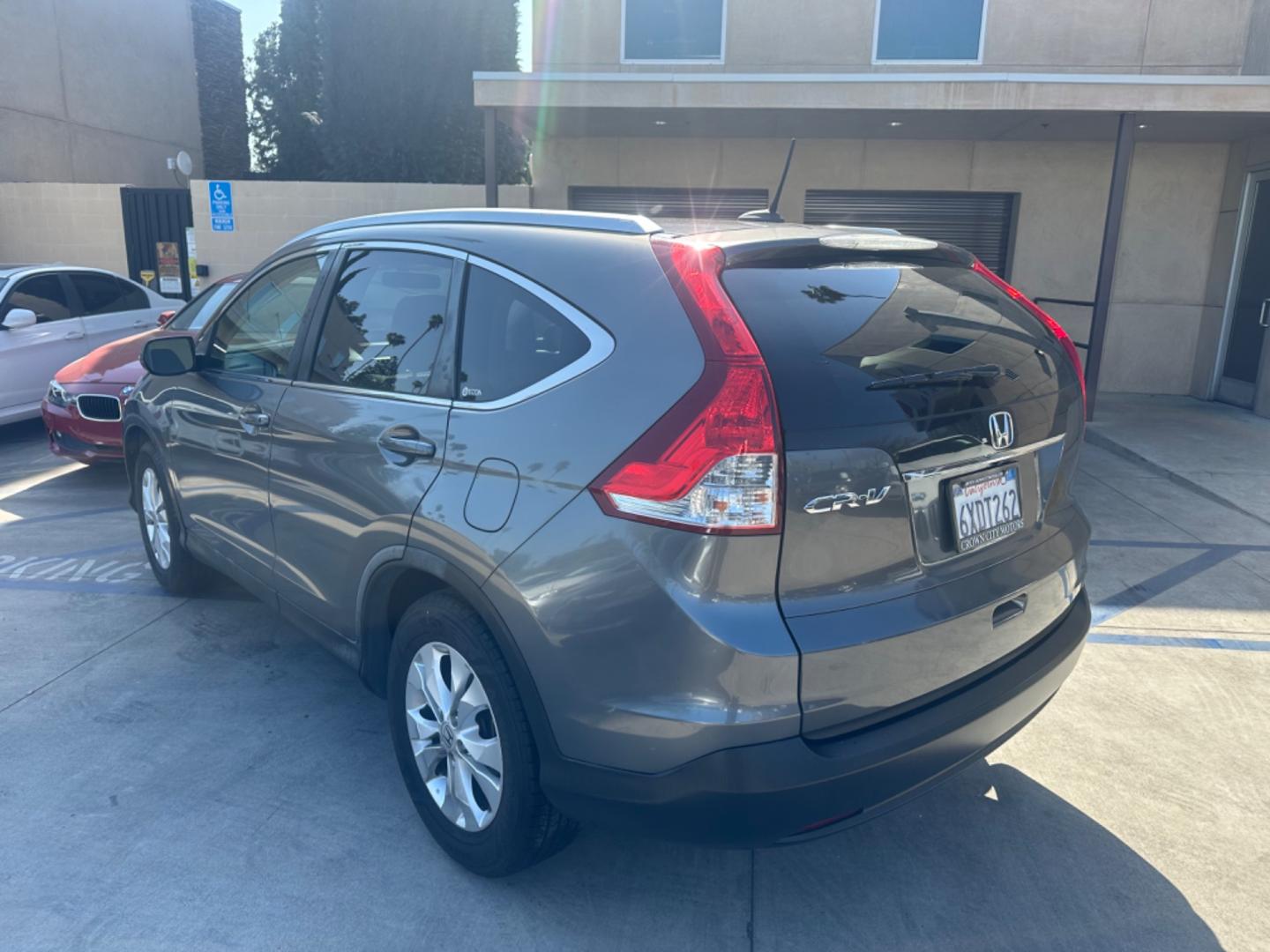 2012 BLUE /GRAY Honda CR-V leather (JHLRM3H70CC) with an 4 CYLINDER engine, Automatic transmission, located at 30 S. Berkeley Avenue, Pasadena, CA, 91107, (626) 248-7567, 34.145447, -118.109398 - Cars and Trucks!! Leather! Moon-roof! Well equipped! In the bustling streets of Pasadena, CA, and the vibrant neighborhoods of Altadena, Glendale, and the broader LA County, finding a reliable, stylish, and affordable vehicle can be a daunting task, especially if you're navigating the complexities - Photo#3